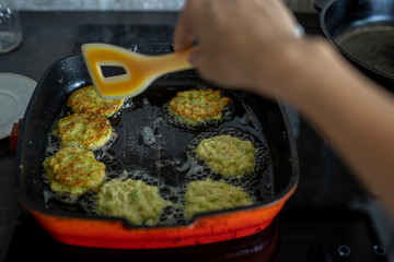 fry the courgettes, turning with a spatula