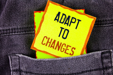 Text sign showing Adapt To Changes. Conceptual photo Innovative changes adaption with technological evolution written Yellow Sticky Note Paper placed the Jeans background.