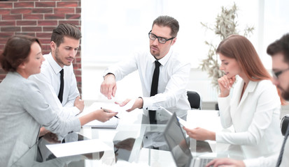 business team discussing business documents