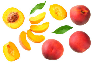 peach fruit with green leaf and slices isolated on white background. top view