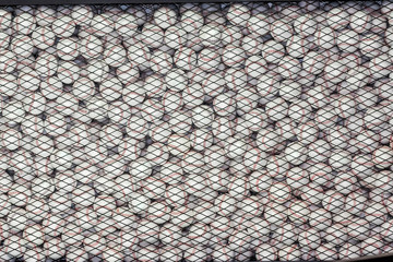 A lot of baseballs are collected and looked like patterns.
