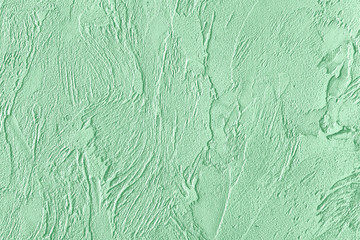 Trendy mint colored low contrast Concrete textured background with roughness and irregularities to...