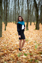 young woman in autumn park