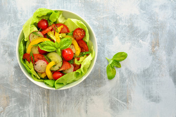 Tomato cucumber radish pepper salad