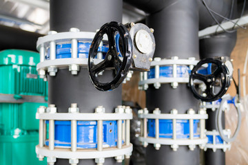 Butterfly valve at the connection hdpe pipe and pp-r pipe. Manual valve, selective focus.