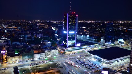 Fototapeta premium Modern office building at night. Night lights, city office building downtown, cityscape view 