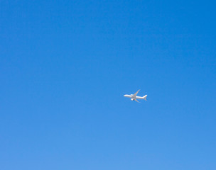 Commercial passenger against blue sky. Lots of blue sky.