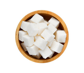 Sugar cubes in wood bowl on white background