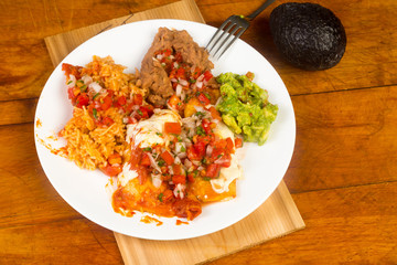 Overhead View of Homemade Mexican Plate on Rustic Background.