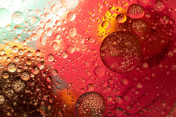 Abstract background with colorful gradient colors. Oil drops in water abstract psychedelic pattern image.