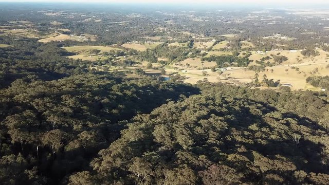 Aerial view over the rural farmland of Kurrajong panning towards Grose Vale