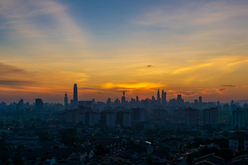 Fototapeta na wymiar Cloudy and haze sunset view over down town Kuala Lumpur, Malaysia.