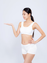 Fototapeta na wymiar Portrait asian woman beautiful body diet with fit presenting something empty copy space on the hand isolated on white background, model girl weight slim with calories, health and wellness concept.