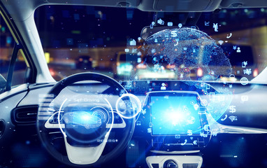 Interior of autonomous car. Driverless vehicle. Self driving. UGV. Advanced driver assistant system.