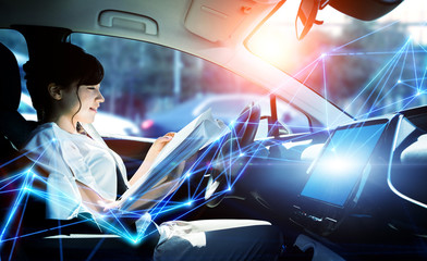 Interior of autonomous car. Driverless vehicle. Self driving. UGV. Advanced driver assistant system.