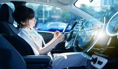 Interior of an autonomous car. Driverless vehicle. Futuristic transportation.