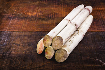 Sugarcane, Cane, Piece of Fresh Sugarcane, Sugarcane on wooden background, Sugarcane Agriculture