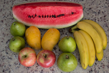 Watermelon, apple, bananas and pears