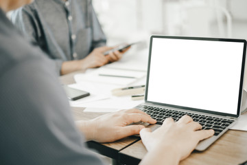 Mockup image of engineers using laptop to drawing design building Project in office, mockup concept