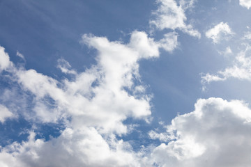 Blue sky background with clouds.