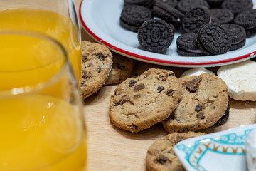  rich, but a lot of sugar on this table of sweets and natural orange juice