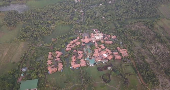 Drone shot flying over beautiful architectural buildings