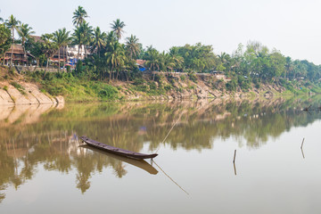 Beautiful scenery of Nam Khan river, a major tributary of Mekong river flowing through Luang Prabang the UNESCO world heritage town in north central of Laos.