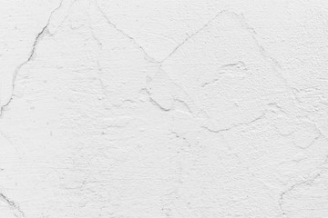 Fototapeta premium Texture of a concrete wall with cracks and scratches which can be used as a background
