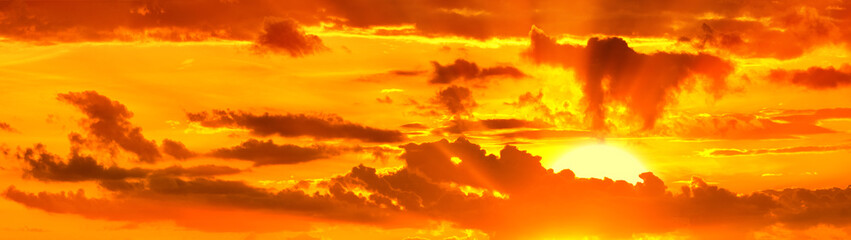 sunset sky with clouds and setting sun panorama landscape background panoramic wide view of natural color of sunrise dawn heaven with dramatic cloudscape design wallpaper high resolution photo