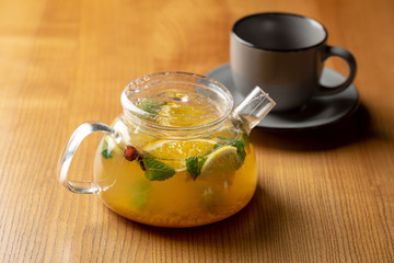 Hot winter tea in glass teapot