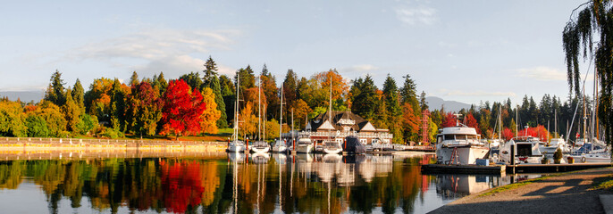 Autumn panoramic view of Vancouver skyline as seen from Stanley Park, British Columbia, Canada.