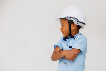 African American kid wearing hard helmet with arms crossed isolated on white background