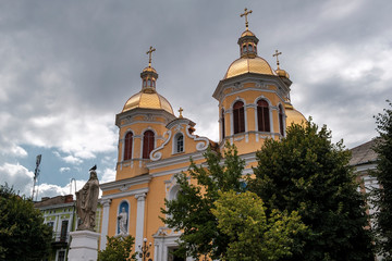 Fototapeta na wymiar Trinity Church at Market Square in Berezhany, Ternopil region, Ukraine. August 2019