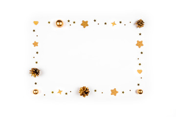 Christmas card. Festive background with pine cones, branches, gold toys.