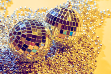 disco ball concept. Isolated on yellow background