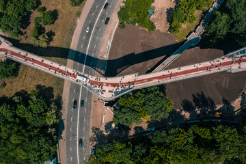 Aerial drone view of new pedestrian bridge from above