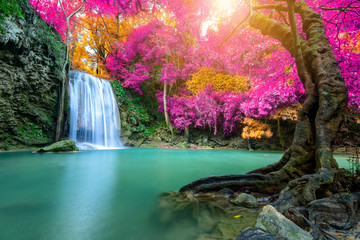 Amazing in nature, beautiful waterfall at colorful autumn forest in fall season