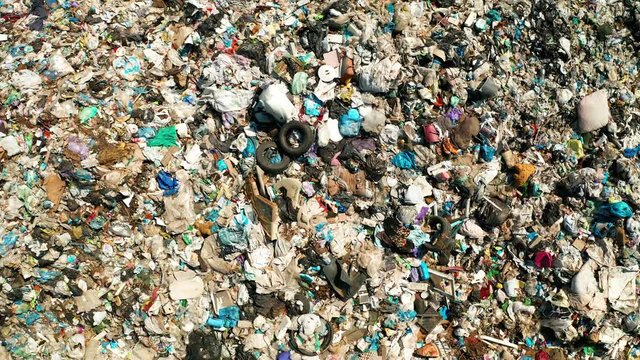 Aerial view of dump in forest. Pollution concept, top view.