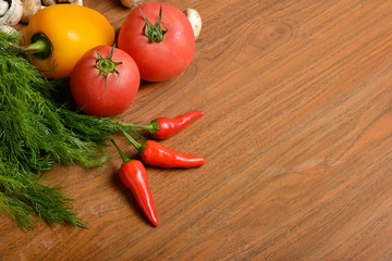 Ingredients for vegetarians, healthy food on a wooden background.