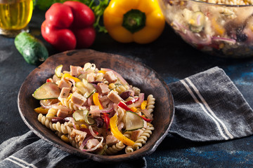 Fusilli pasta salad with smoked turkey