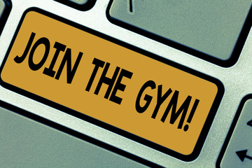 Writing note showing Join The Gym. Business photo showcasing Motivation to start working out making exercises fitness Keyboard key Intention to create computer message pressing keypad idea