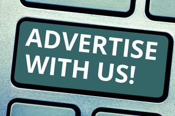 Fototapeta premium Text sign showing Advertise With Us. Conceptual photo marketing make product service known in order sell it Keyboard key Intention to create computer message pressing keypad idea