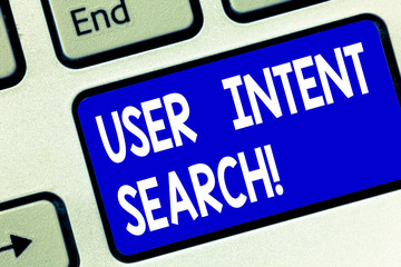 Writing note showing User Intent Search. Business photo showcasing what demonstrating looking for when conducting searching query Keyboard key Intention to create computer message pressing keypad idea