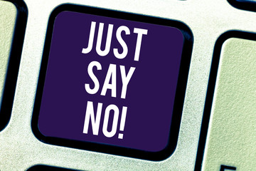 Text sign showing Just Say No. Conceptual photo Do not be afraid of giving negative answers to some things Keyboard key Intention to create computer message pressing keypad idea