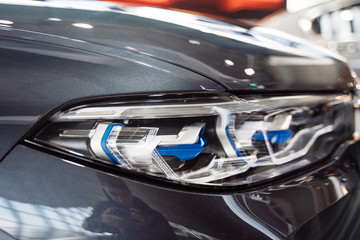 Fototapeta premium Macro photo of automobile exterior detail as technological design.