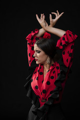 Close-up flamenca dancer raising hands