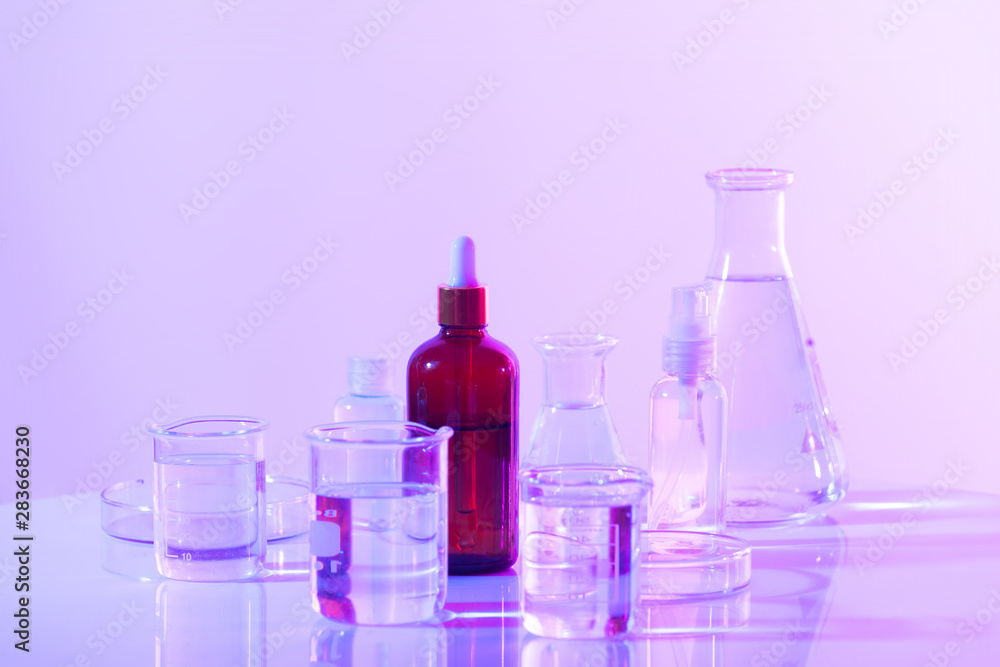 Wall mural flask of water olution in science laboratory background