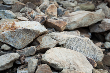 Big and small stones. The mountains. The texture of the stone. Background