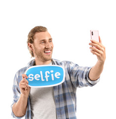 Male blogger taking selfie on white background