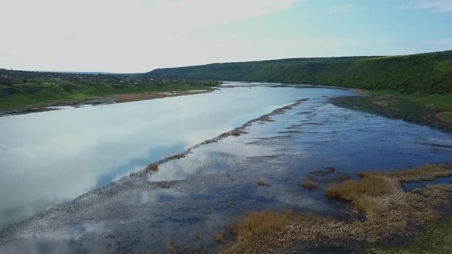 Flight over the river at spring time. Dniester river of Moldova republic.